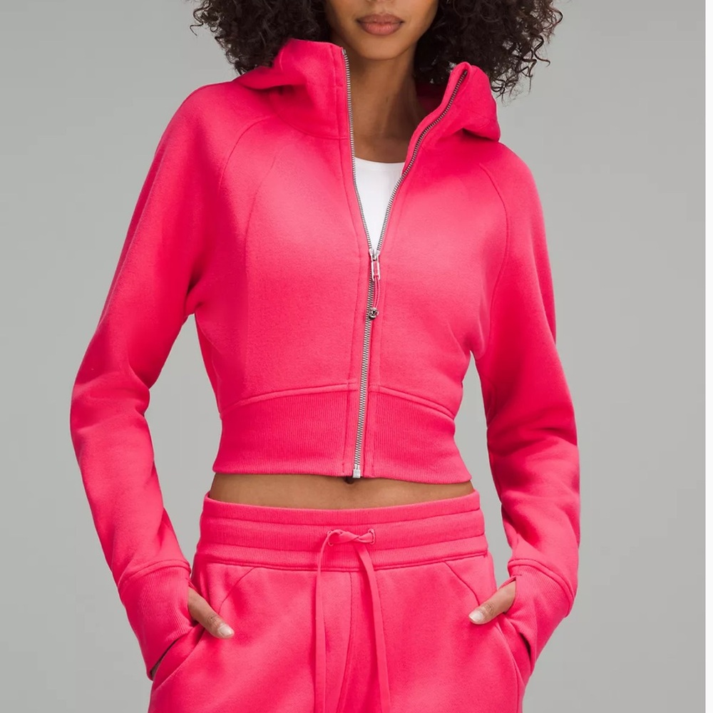 Brand new with tags Lululemon full zip hoodie, size 10.